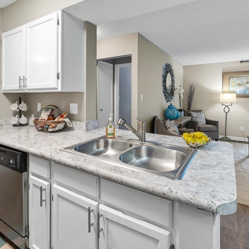 Spacious kitchens with thoughtful details a kitchen with white cabinets