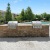 outdoor grilling area next to the pool